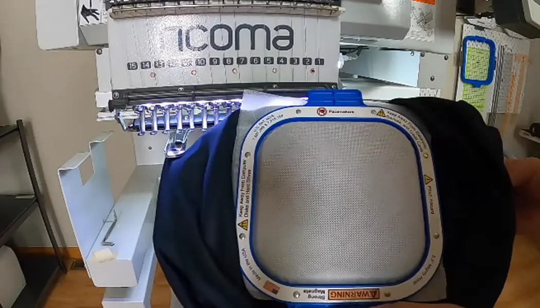 Take the hoop into the machine 