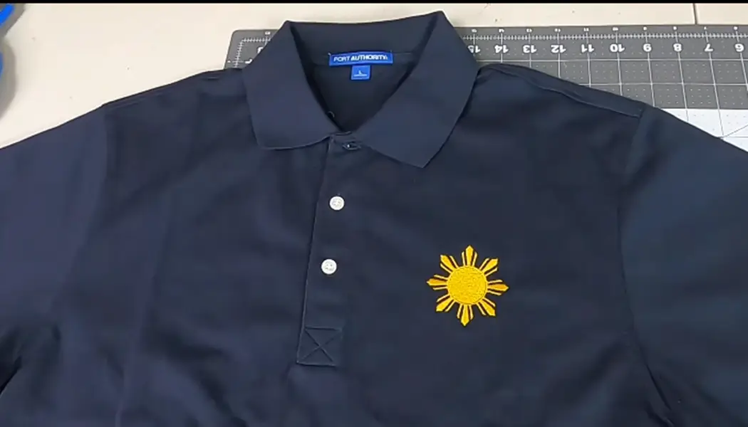 design on the left chest over any garment