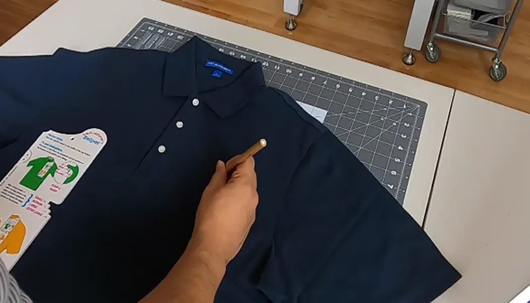 Put a small dot over the embroidery area 