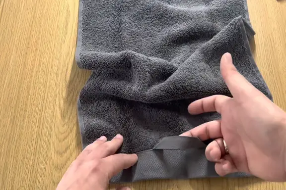 mark the middle of towel 2