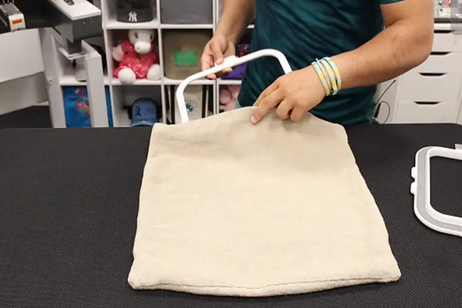 take the bottom piece inside the pillow