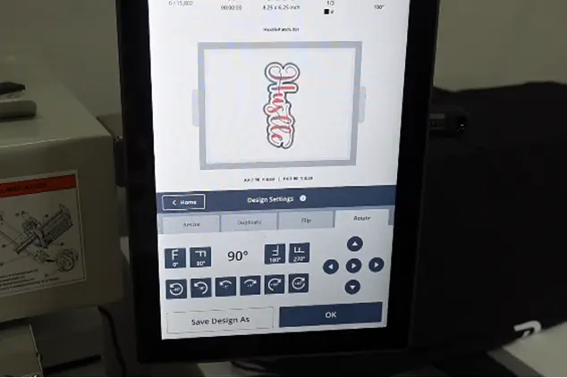 Insert-the-hoop-in-the-machine-and-adjust-the-design-set-step-2 part 2