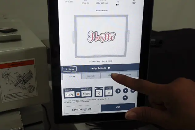Insert-the-hoop-in-the-machine-and-adjust-the-design-set step 1 part 1