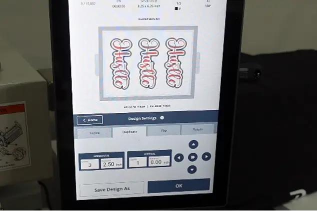Insert the hoop in the machine and adjust the design set step-2 paert 1